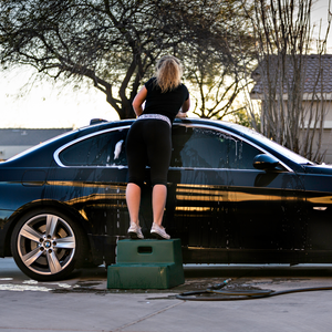girl washing car standing on green Mounting 2 Step